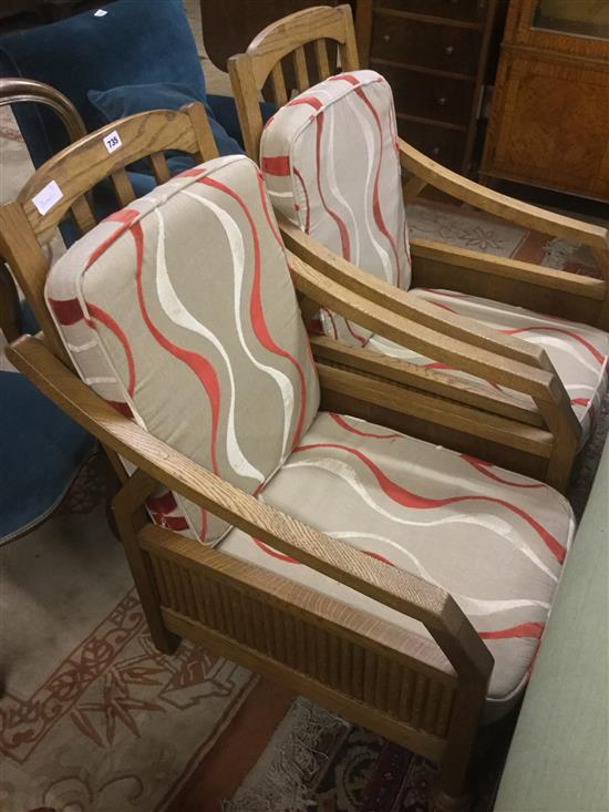 Pair 1930s oak reclining chairs